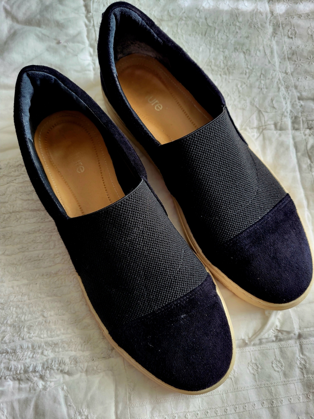 Nurture Black Slip-On Women's Flats with Tan Sole